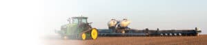 John Deere Tractor harvesting